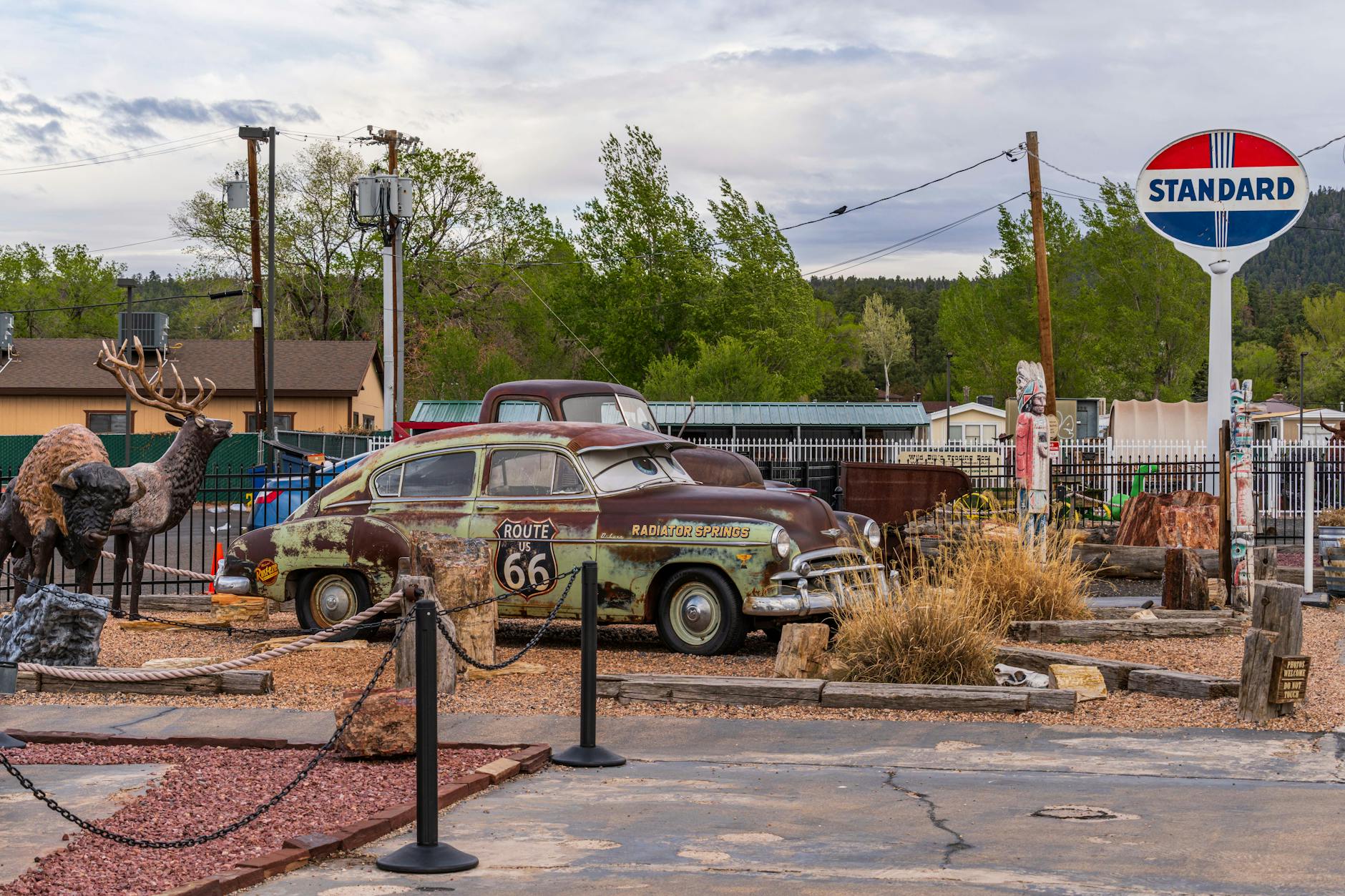 Explore the nostalgic Route 66 car display in Williams, Arizona, capturing vintage automobile culture.